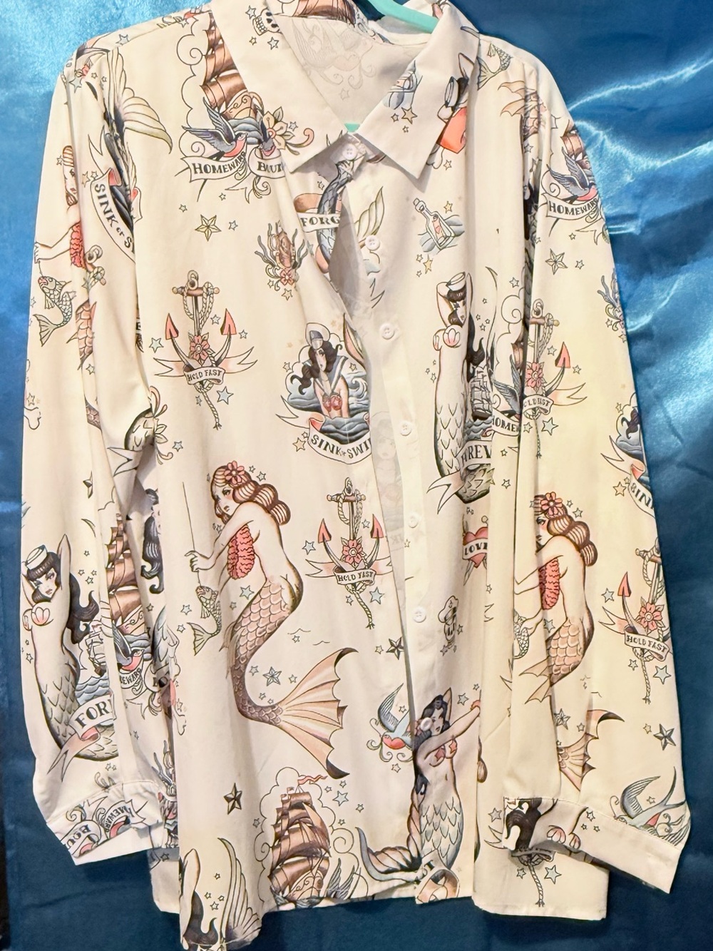 Mermaid button up blouse.